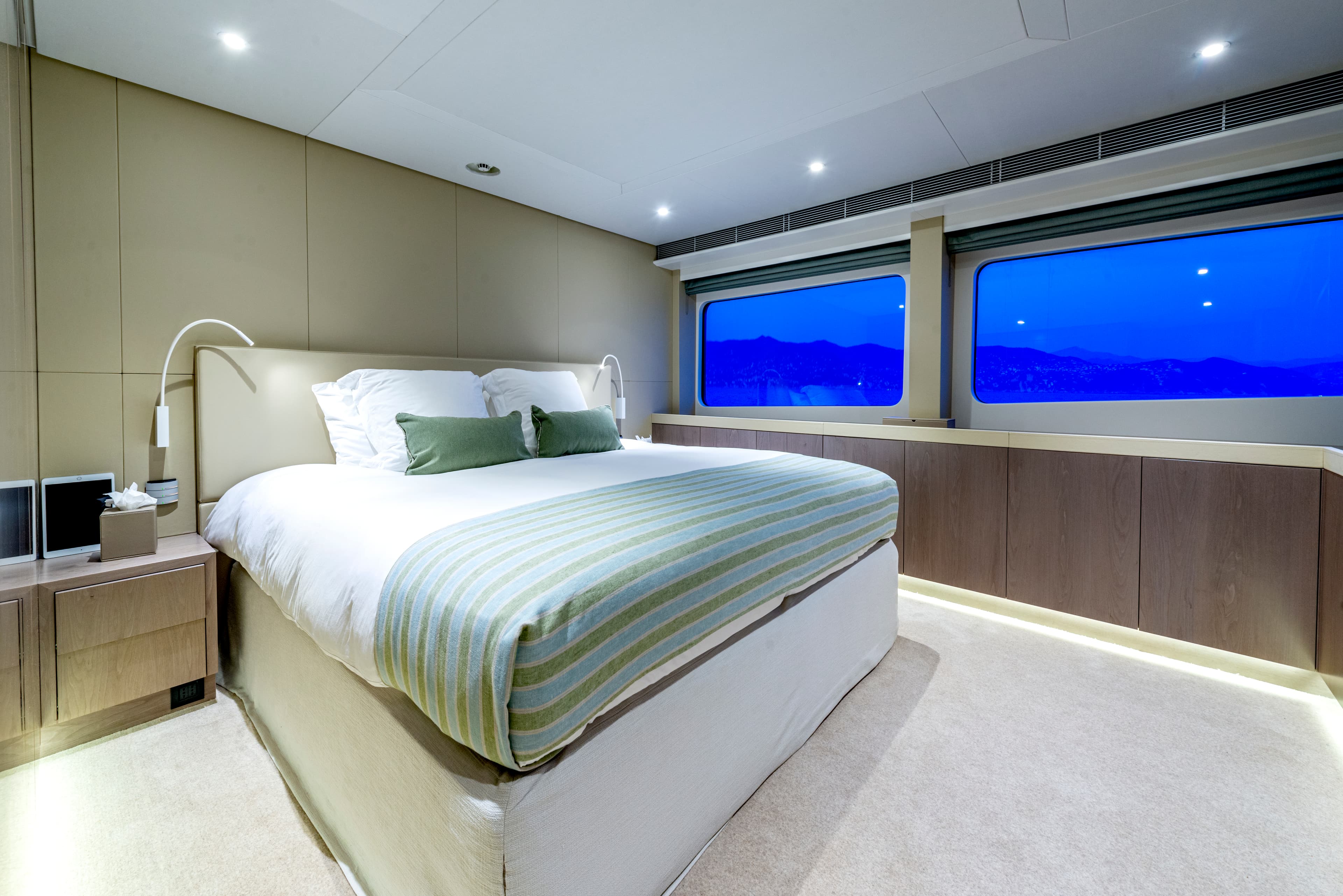 UNEXPECTED Master Suite — king bed with panoramic dusk views